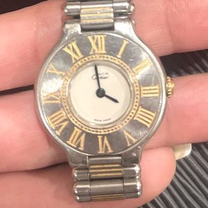 Cartier Must two tones. Closer needs repair & a new battery.price new $1550.00